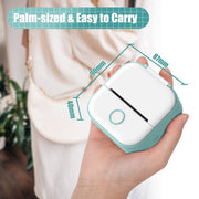 Portable Printer - Compact & Efficient design in white with teal trim, ideal for quick sticker printing on the go, shown with accessories.
