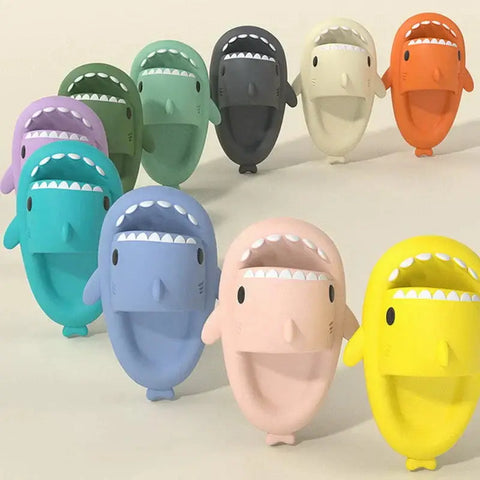 Shark Themed Pool Slides in multiple colors including yellow, pink, blue, and green, designed for fun and comfort during summer activities.