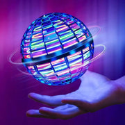 Flying Spinner - Fun & Exciting Toy with LED lights hovering above a hand against a purple background. Ideal for interactive play and tricks.